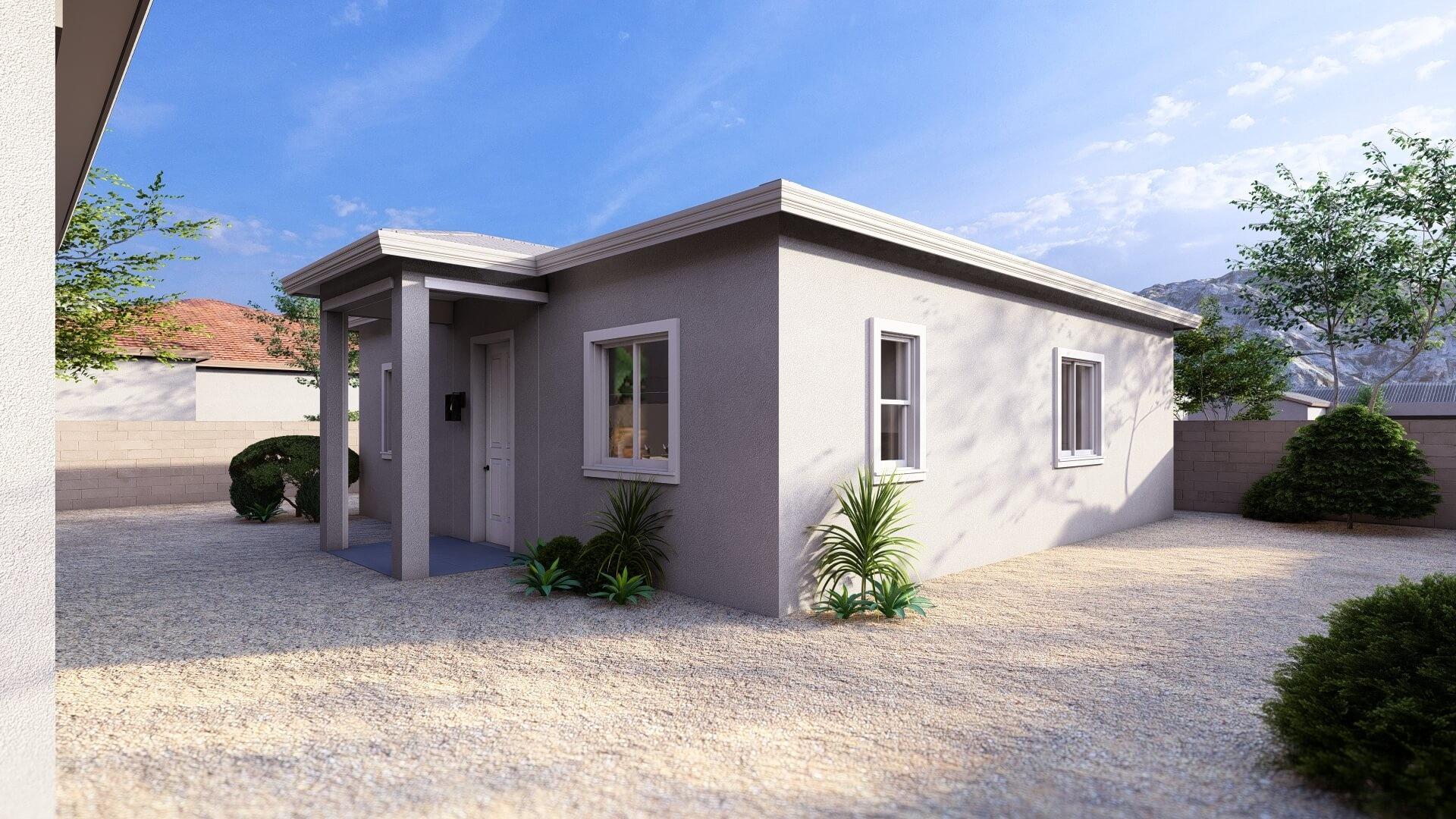 Single-story stucco house with desert landscaping